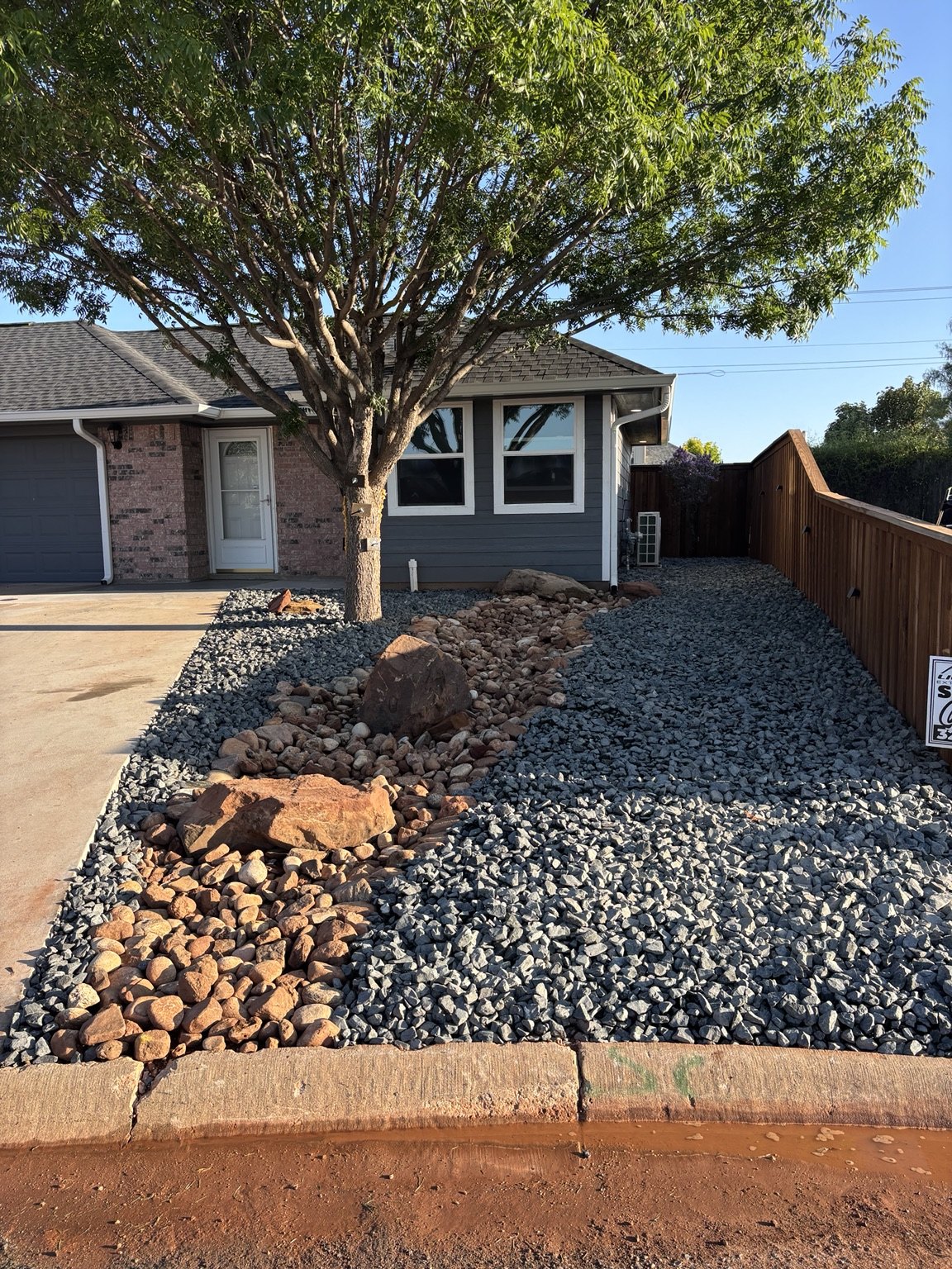 Decorative rock landscape installation by Polo Outdoor